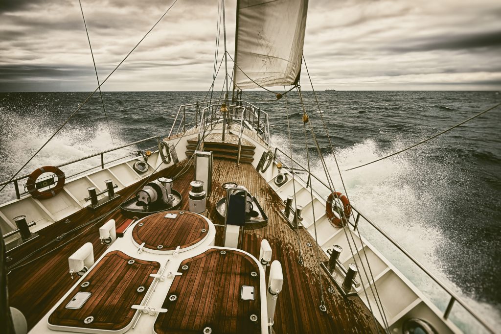 Sailing,Yacht,At,Sunset,During,A,Storm.,Toned,Image,And