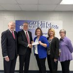 Don O. Walsworth and Jeff Vogel present a $2,500 check to Kensie Daleske, Melinda Wilbeck and Denise Carlson from Brookfield R-III School District.