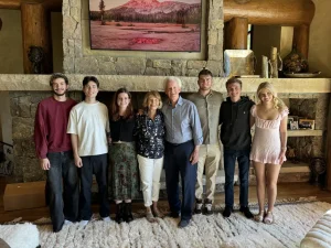Bruce and his wife Pam with their grandchildren